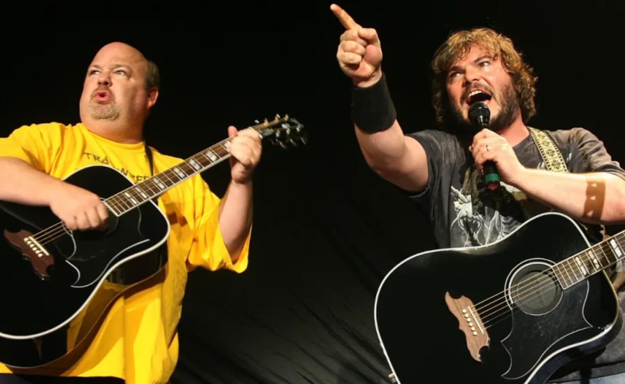 Kyle Gass and Jack Black of Tenacious D performing live on stage.