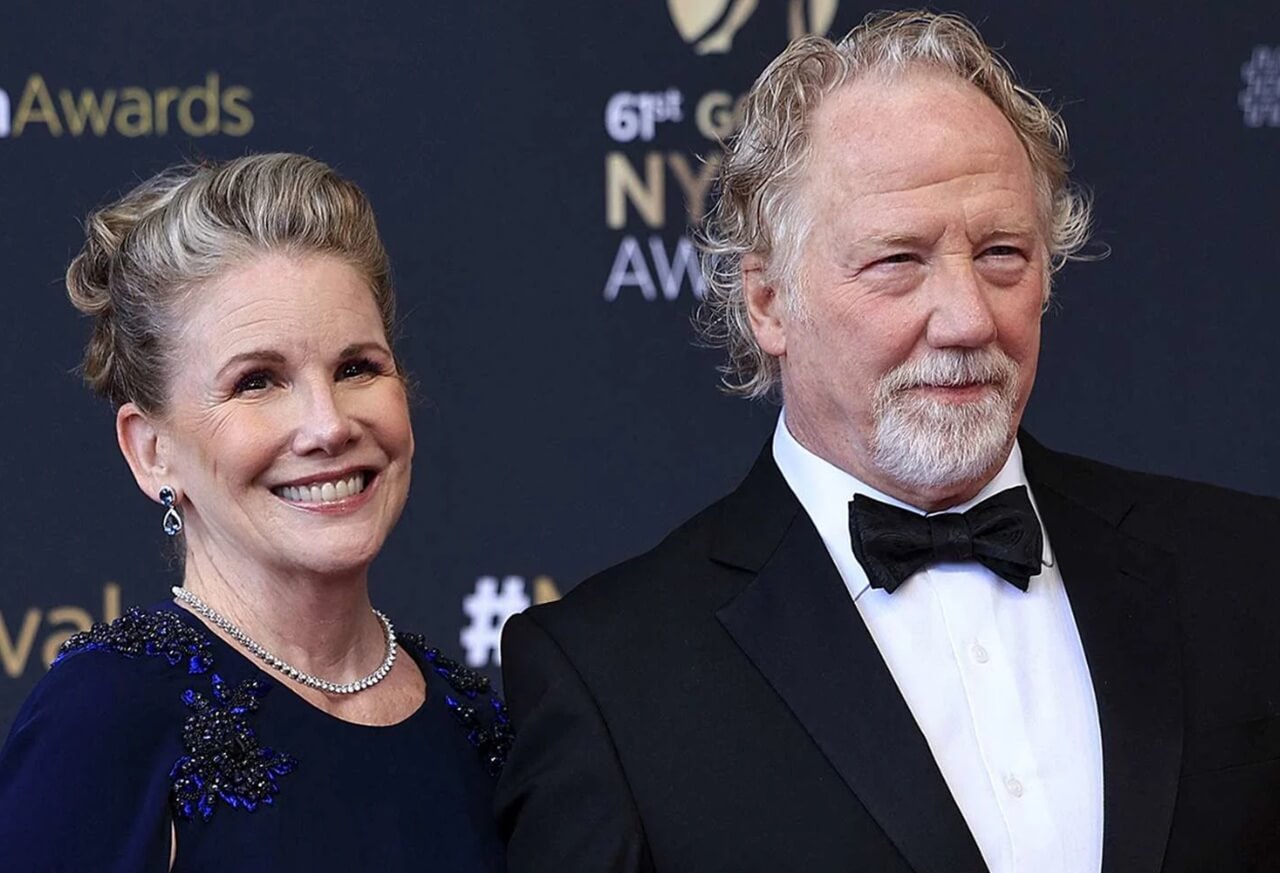 Melissa Gilbert and Timothy Busfield smiling at a public event.