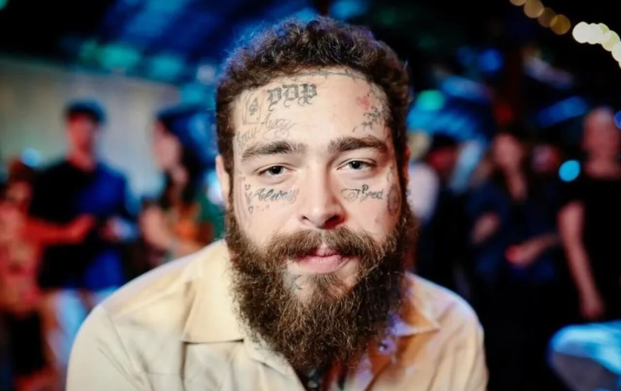 Post Malone laughs during a Twitch stream after a failed backflip attempt.