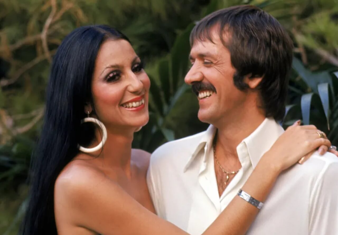 Sonny Bono and Cher performing on stage, showcasing their legendary bond.
