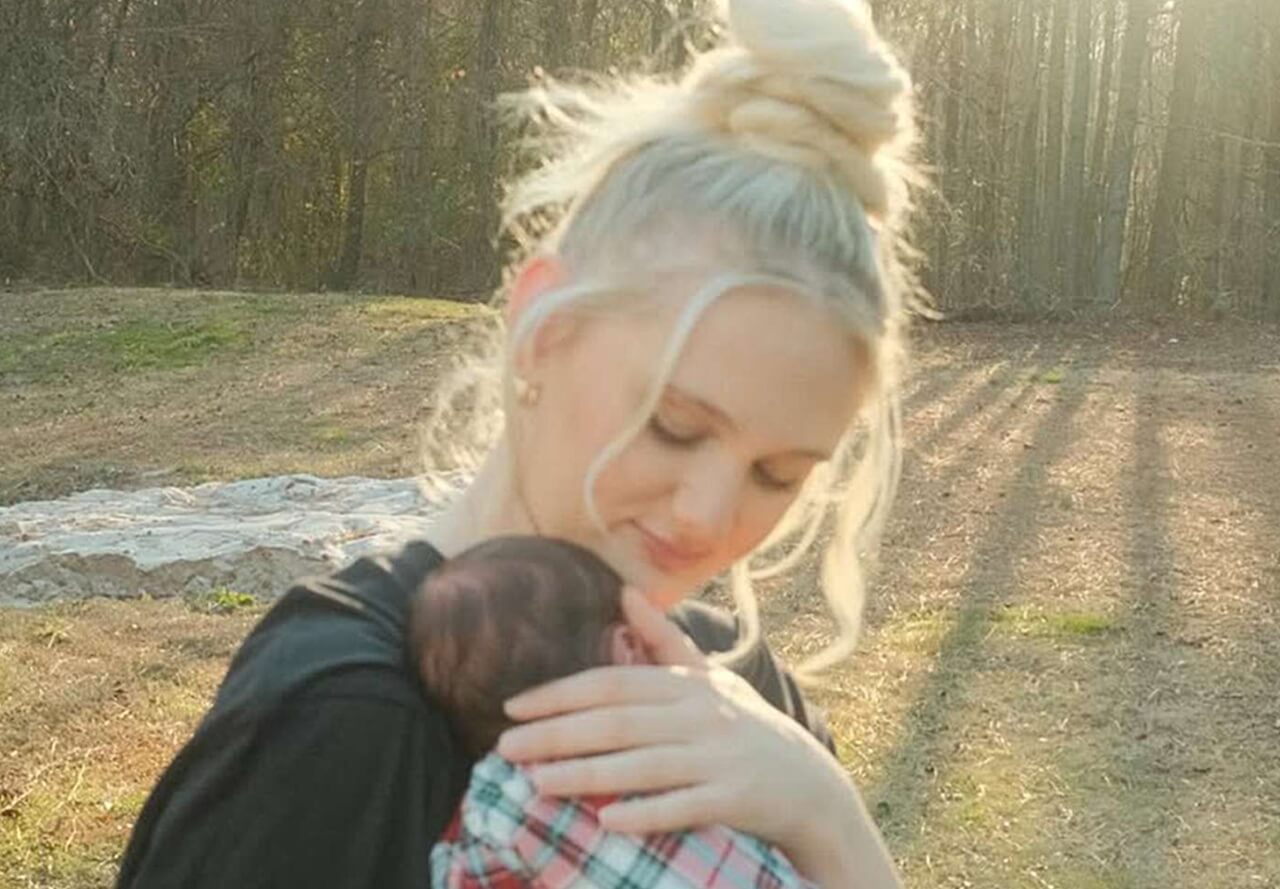 TikTok creator Tini Younger shares a tender moment with her newborn daughter following the loss of her twin.