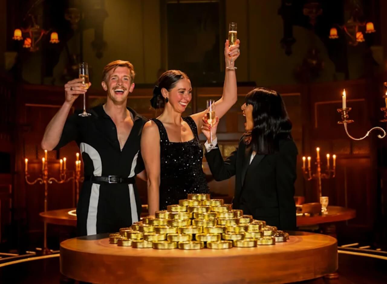 Rachel Duffy and Stephen Libby win The Traitors UK finale, celebrating with Claudia Winkleman.