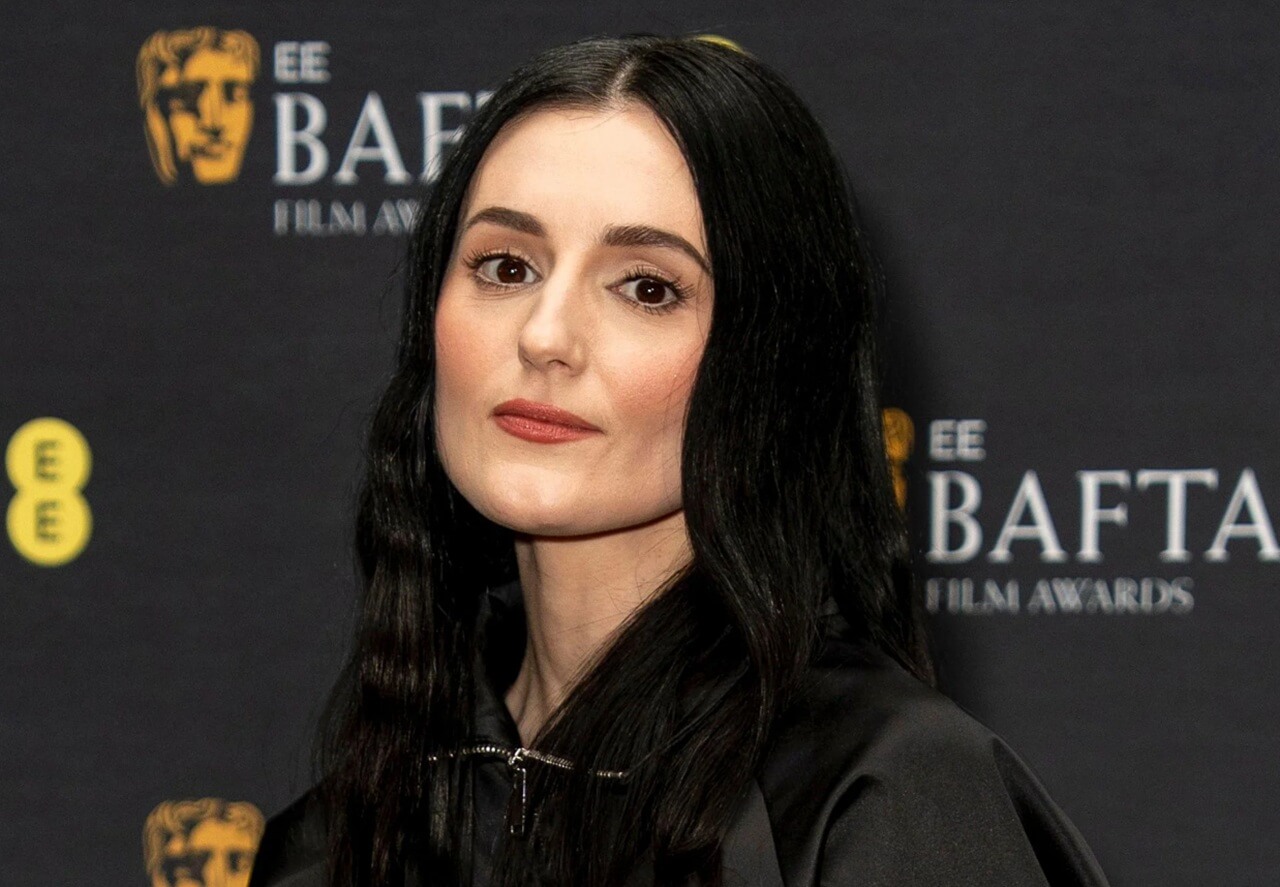Posy Sterling at Bafta Rising Star announcement, smiling in black outfit.