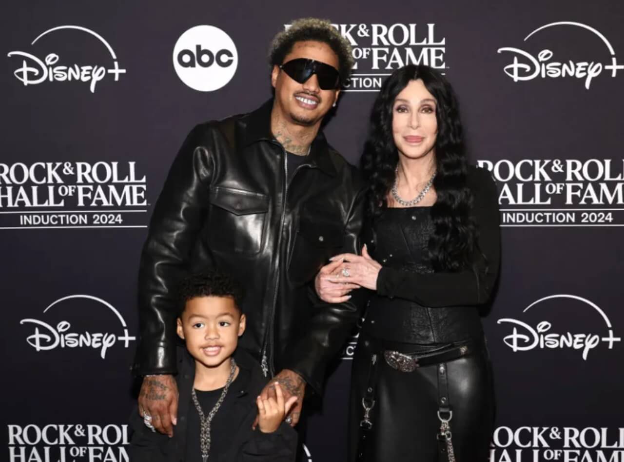 Cher with Alexander Edwards and his son Slash, sharing a family moment
