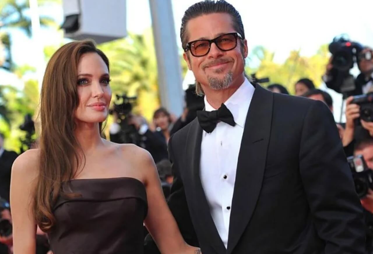 Angelina Jolie and Brad Pitt at a red-carpet event amid ongoing legal disputes.