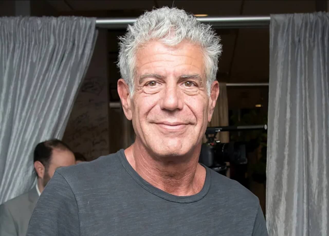 Classic Chicago-style hot dog with full toppings on a poppy seed bun.