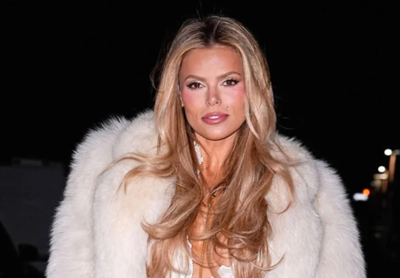 Brooks Nader dancing in string-held dress on yacht