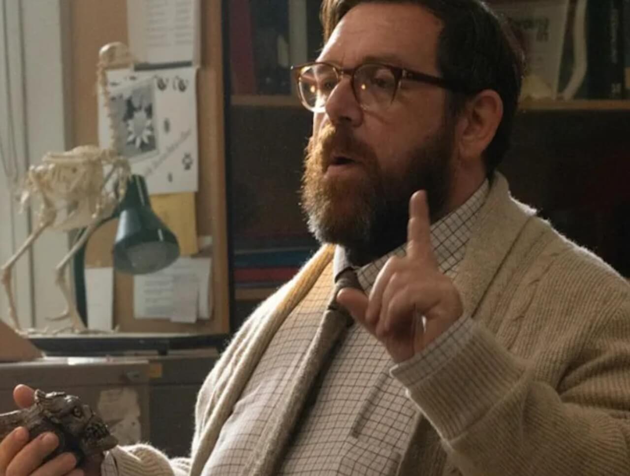 Nick Frost in Whistle holding Aztec death whistle.