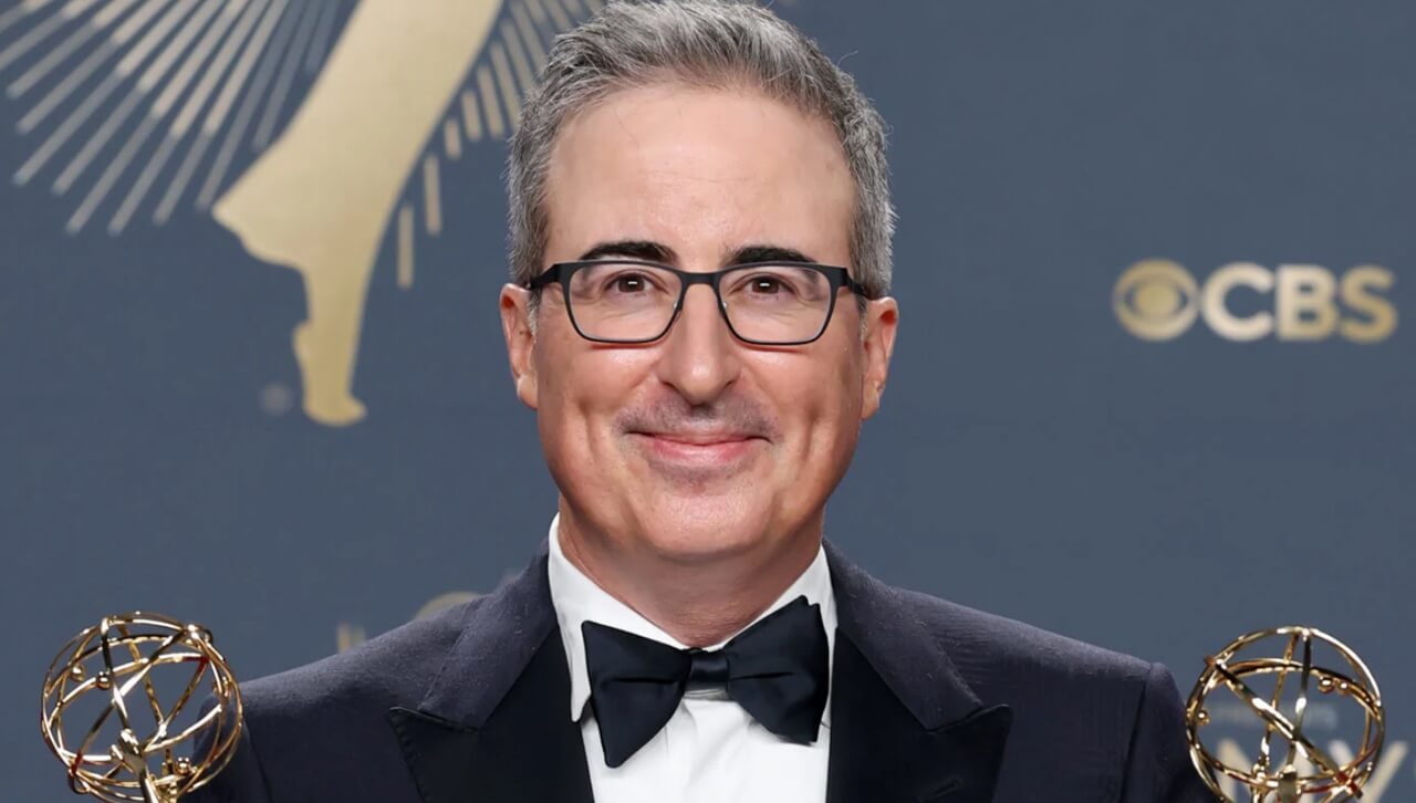 John Oliver hosting Last Week Tonight amid merger concerns.