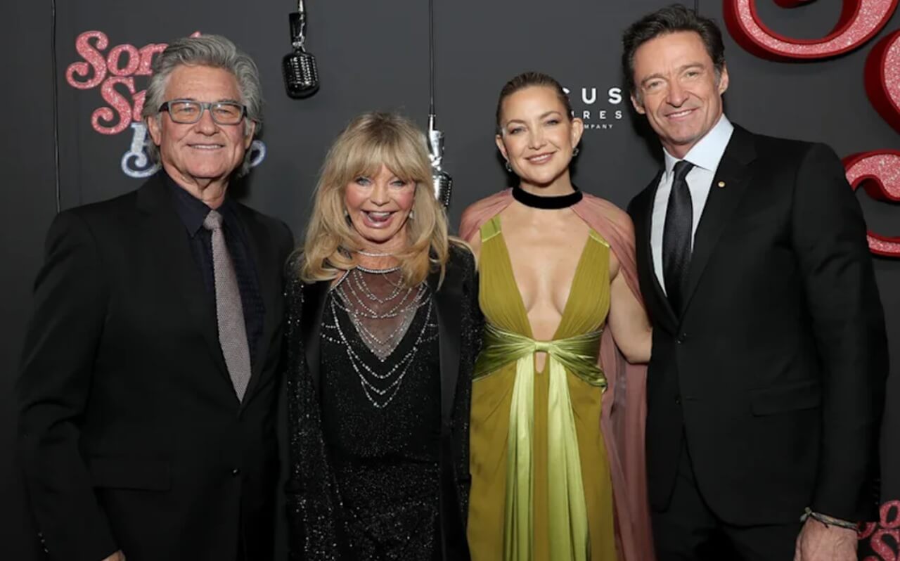 Kate Hudson with Kurt Russell and Goldie Hawn at a red carpet event