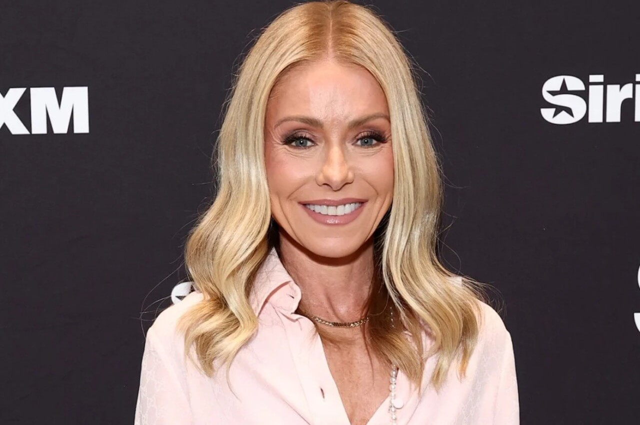 Kelly Ripa discusses family photo dispute on podcast.