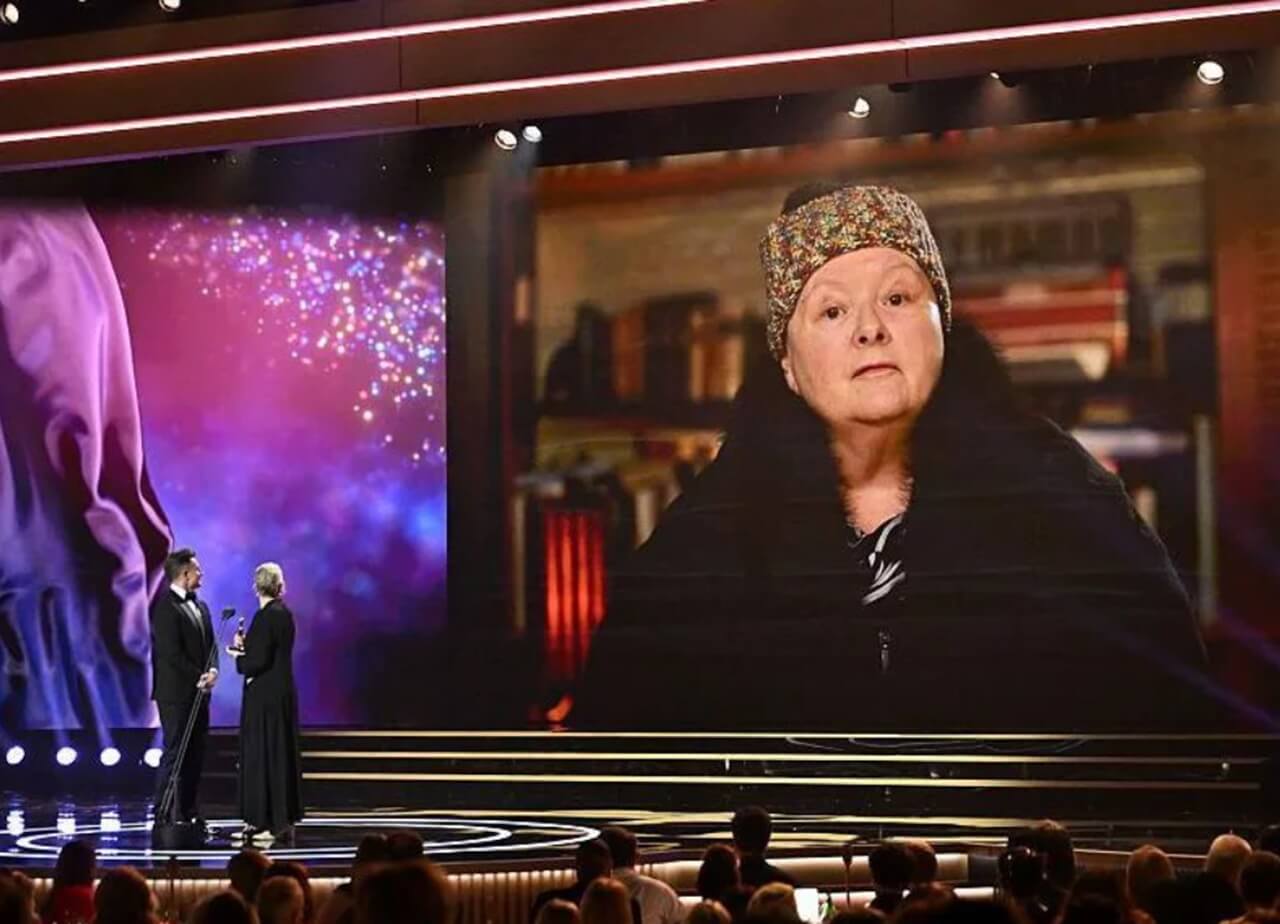 Magda Szubanski smiling at an event after announcing cancer remission.