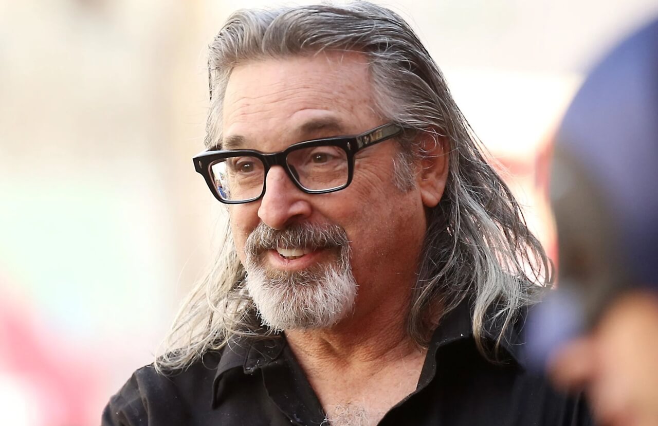 Robert Carradine at film premiere, smiling at fans