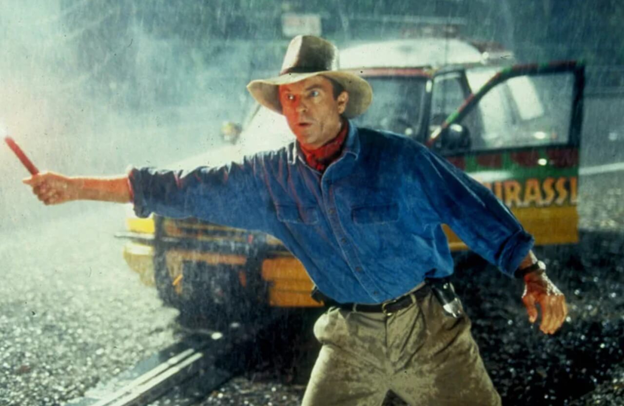 Sam Neill reacts to Alan Grant reference in Jurassic World Rebirth.