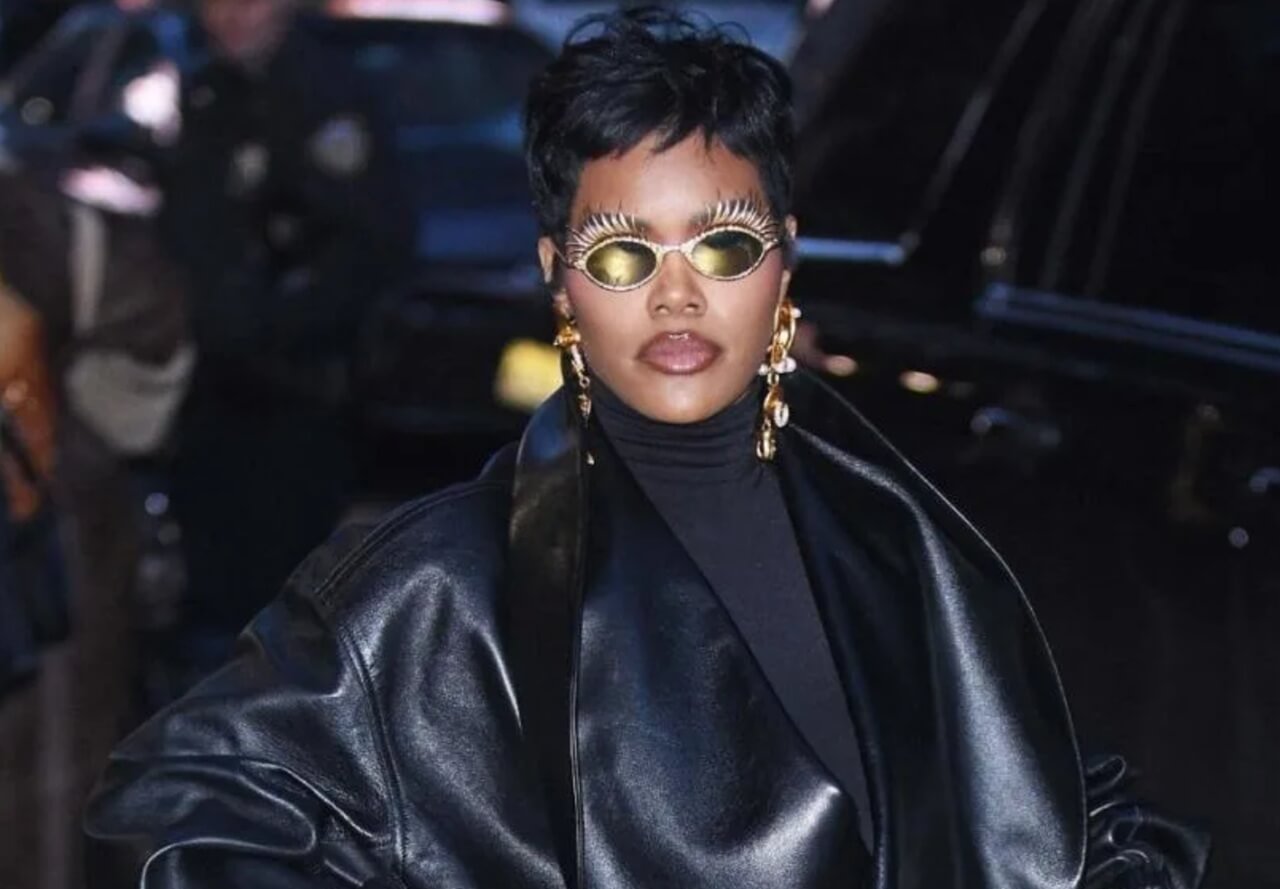 Teyana Taylor poses on the red carpet in a stunning gown ahead of the Oscars.