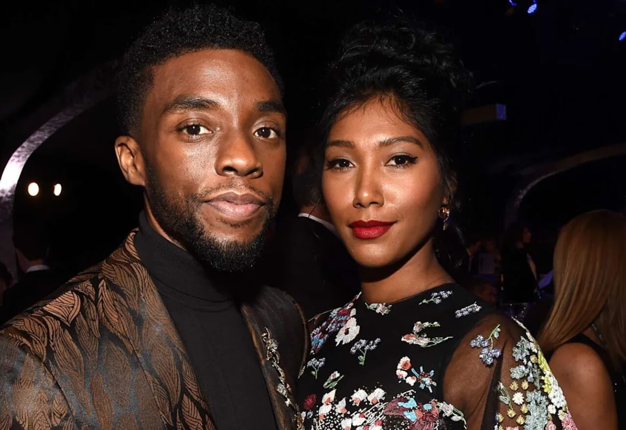 Chadwick Boseman with wife Simone Ledward-Boseman at premiere.