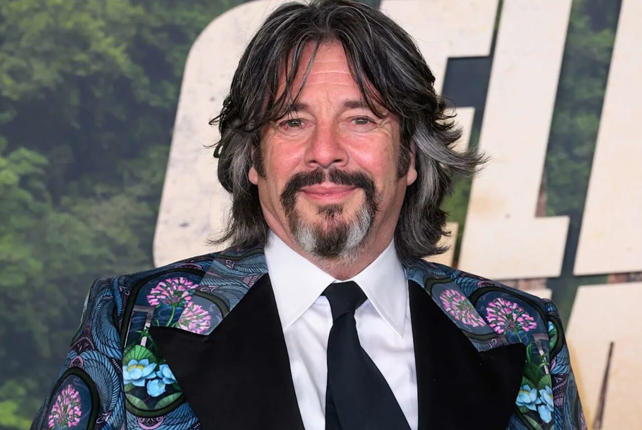 Laurence Llewelyn-Bowen, 61, opens up about financial struggles and family life in his Cotswolds manor.