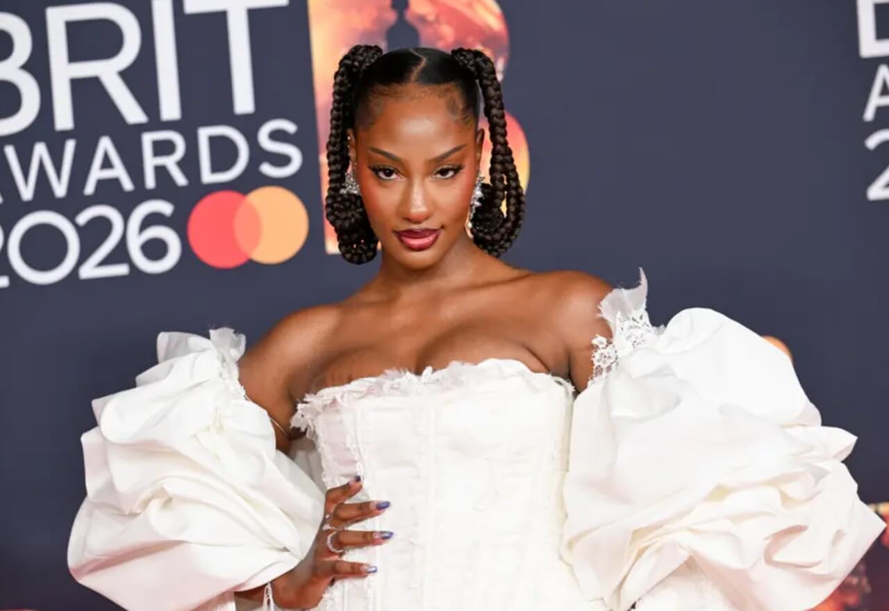 Jorja Smith and Tems performing together at a festival.