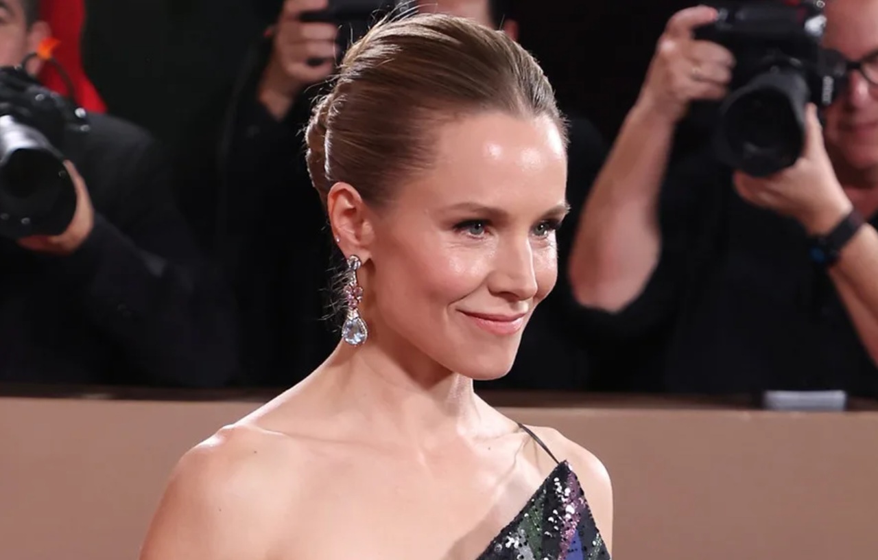 Kristen Bell sings during her comedic stage name monologue at the Actor Awards 2026.