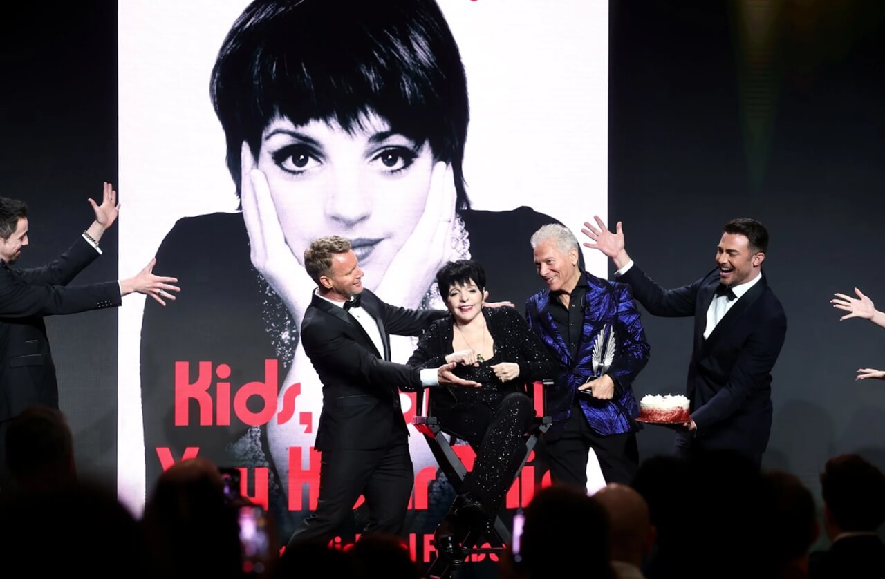 Liza Minnelli at GLAAD Awards and Judy Garland singing onstage.