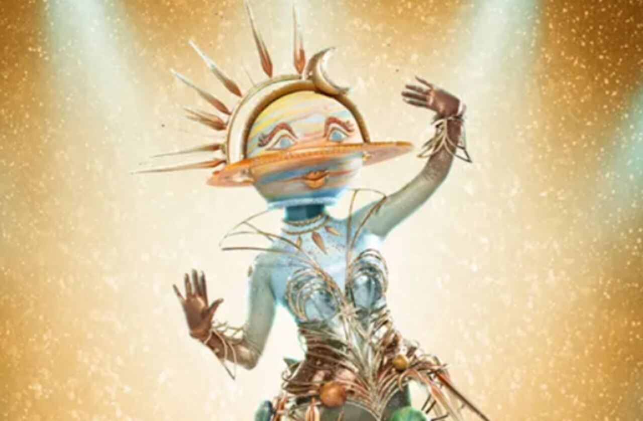 Masked Singer Season 14 contestants perform as judges react to a dramatic unmasking.