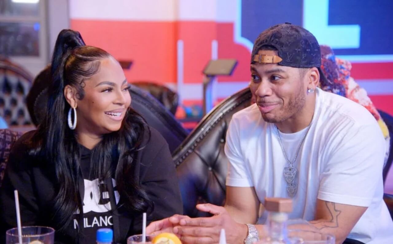 Nelly and Ashanti pose together at Peacock premiere.