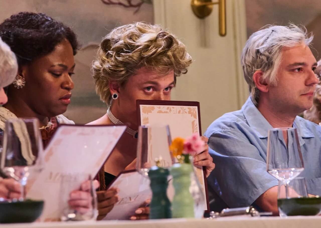 SNL U.K. cast posing in London street set with comedic flair.