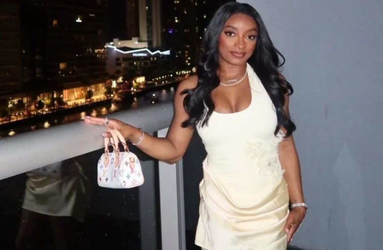 Simone Biles stuns in short white dress for her 29th birthday Instagram post.